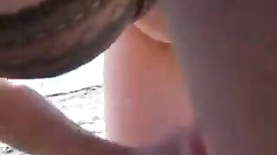 Big titty blowjob on the beach