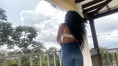 Good girl trying on cute clothes, squats on camera