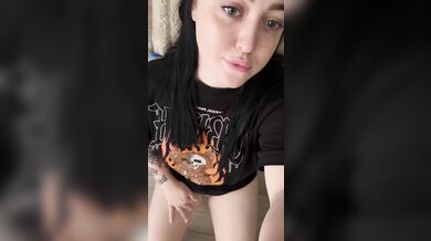 A beautiful brunette strokes her gorgeous thighs.