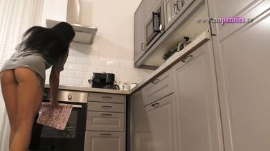 Sexy and Horny Petite Brunette Girl loves to Flash her Shaved Pussy and gets Bored and Ignored in the Kitchen