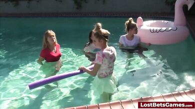 A guy enjoying being sucked and fucked in the pool by several hot babes