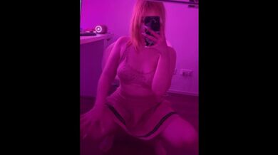 Cute blonde squeezes her breasts in lingerie