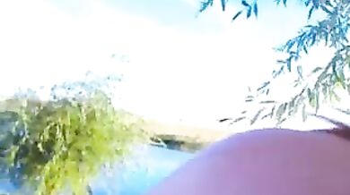 Gorgeous live girl naked at the quiet lake