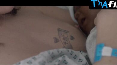 Alice Isaaz Breasts Scene in Elle