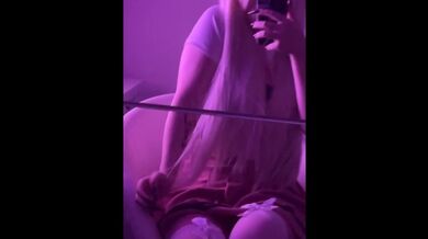 Beautiful student in stockings touches her breasts