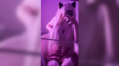 Beautiful student in stockings touches her breasts