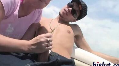 Seductive blonde has her big boobs jizzed on boat