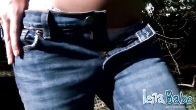 Short-haired blond taking it all off