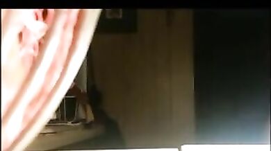 Grandme Chrissy toplees getting ready for work in the kitchen.