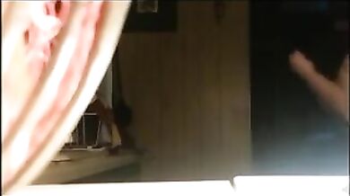 Grandme Chrissy toplees getting ready for work in the kitchen.