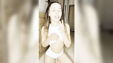 Beautiful bitch in white lingerie shows her breasts????