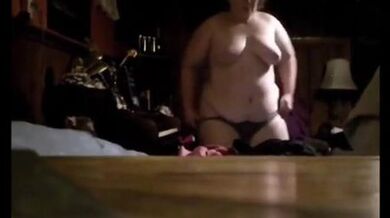 Grandma Chrissy helps make the bed nude.