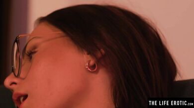 Cutie in kinky black leather rides her dildo to an orgasm