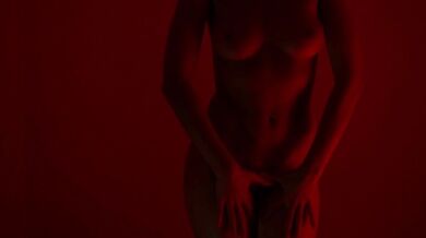 A very beautiful girl with a perfect body dances naked