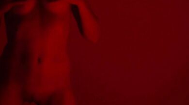 A very beautiful girl with a perfect body dances naked