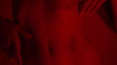 A very beautiful girl with a perfect body dances naked