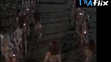 Nikki Fritz Breasts Scene in Dinosaur Island