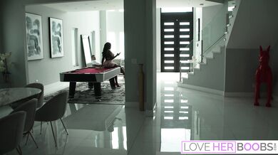 The busty goddess even graces her lover with a blowjob and gets fingered until she squirts all over the couch in between thei