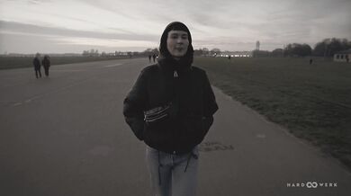 HARDWERK Skinny babe Delfine Dahlia is caged up and sucking multiple dicks