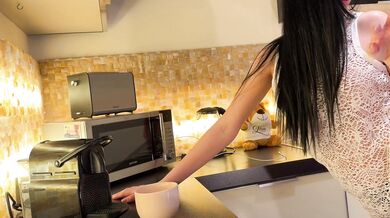 Super hot sexy brunette big booty big boobs wife in a see through dress works in the kitchen at home