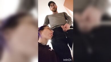 pixie with her fat tongue out waits next to Master while He's pissing then licks the dripping tip