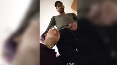 pixie with her fat tongue out waits next to Master while He's pissing then licks the dripping tip