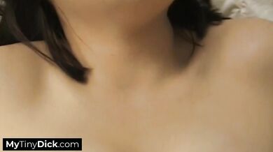 Using both her tits and foot to jerk his tiny cock