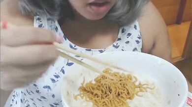 Cute feedee eats noodles for her feeder