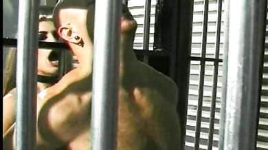 Horny dude gets hard anal fuck in the prison from a sexy babe with big strap on