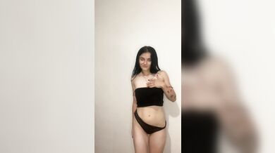 Bitch in dark lingerie shows her breasts????