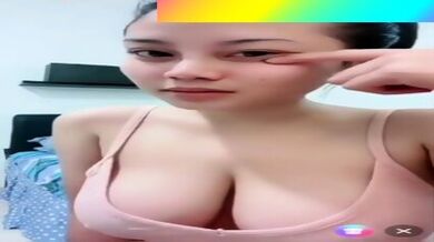 Asian Babe Showing Off Her Big Amazing Tits LIVE