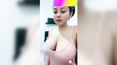 Asian Babe Showing Off Her Big Amazing Tits LIVE