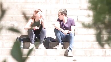 Brunette young girl gets caught in the street