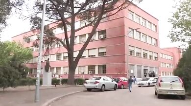 Brunette young girl gets caught in the street