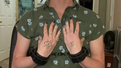 Horny handcuffed Tgirl cums