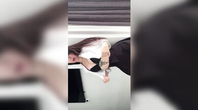 An aroused woman in a caress.