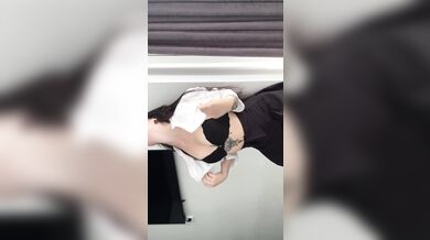 An aroused woman in a caress.