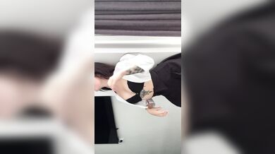 An aroused woman in a caress.