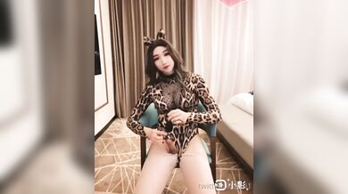 Leopard body outfit in an amateur ladyboy masturbating her tiny dick
